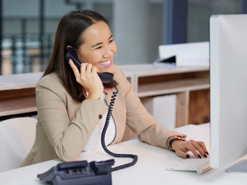 A photo of an agent answering the call after a client contact irock
